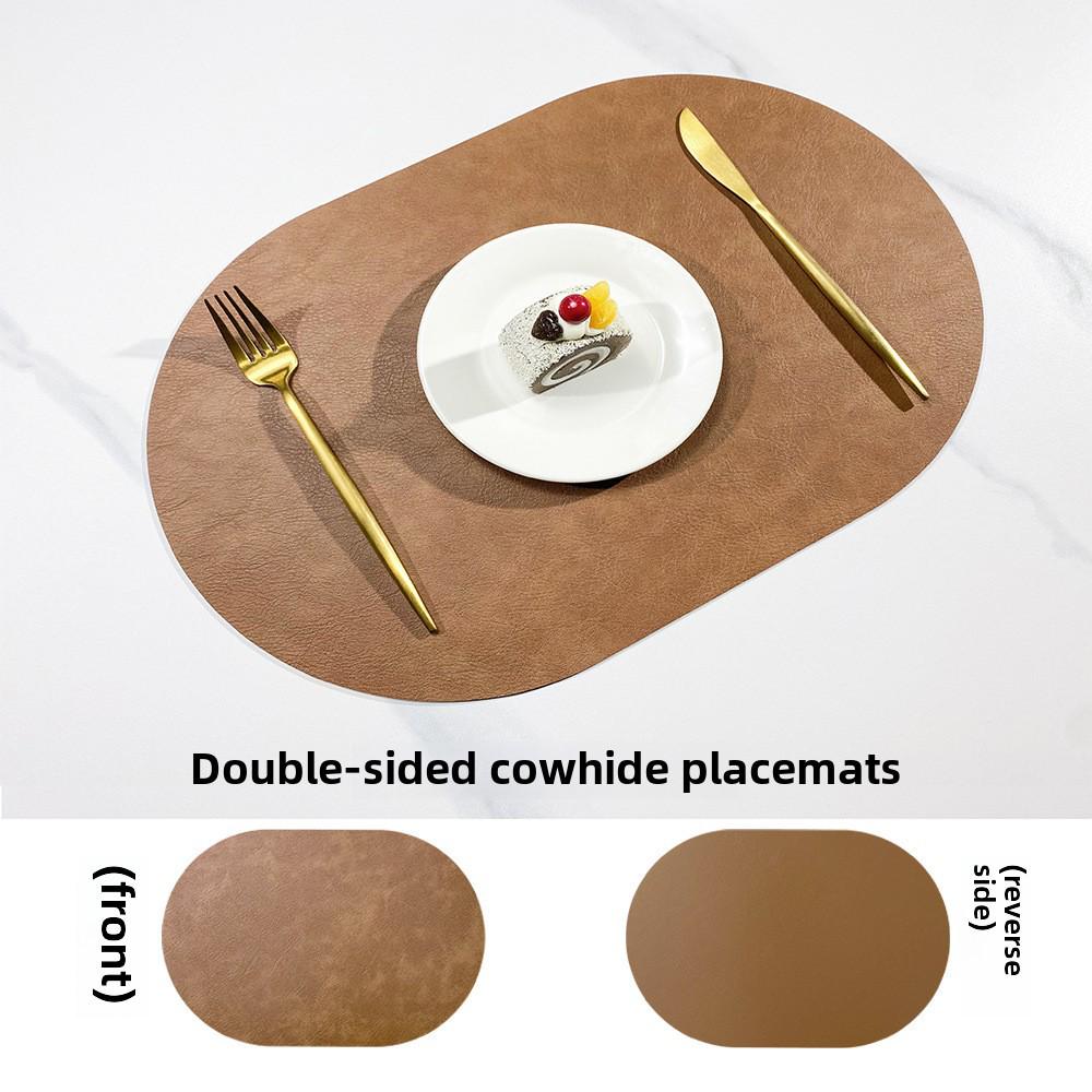 Двусторонний коврик под приборы из коровьей кожи в скандинавском стиле - водонепроницаемый и маслостойкий овальный изоляционный коврик