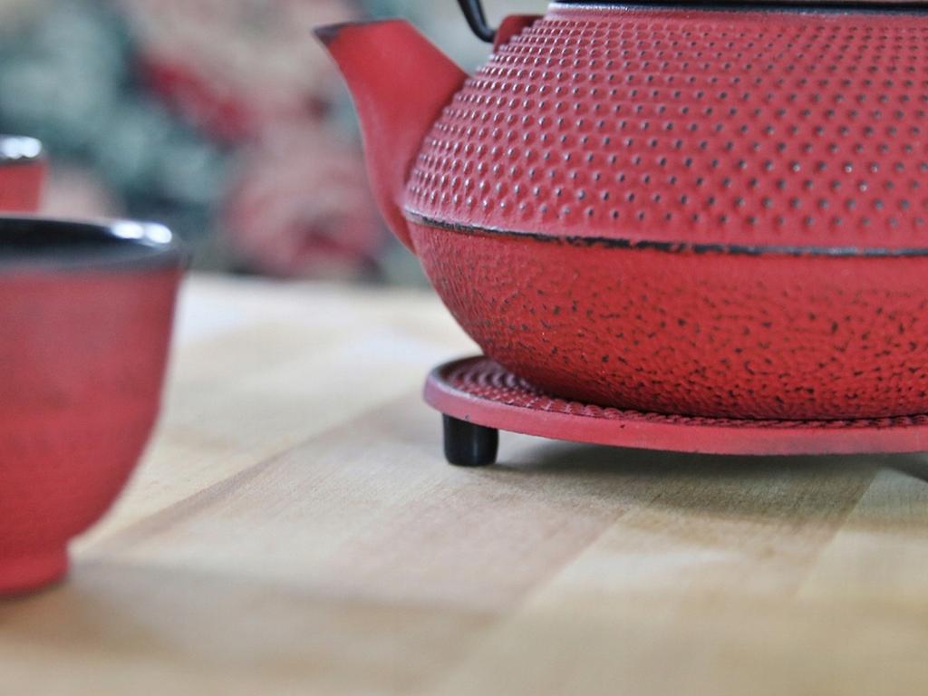 Cast Iron Protective Stand For A Hot Kettle Pot