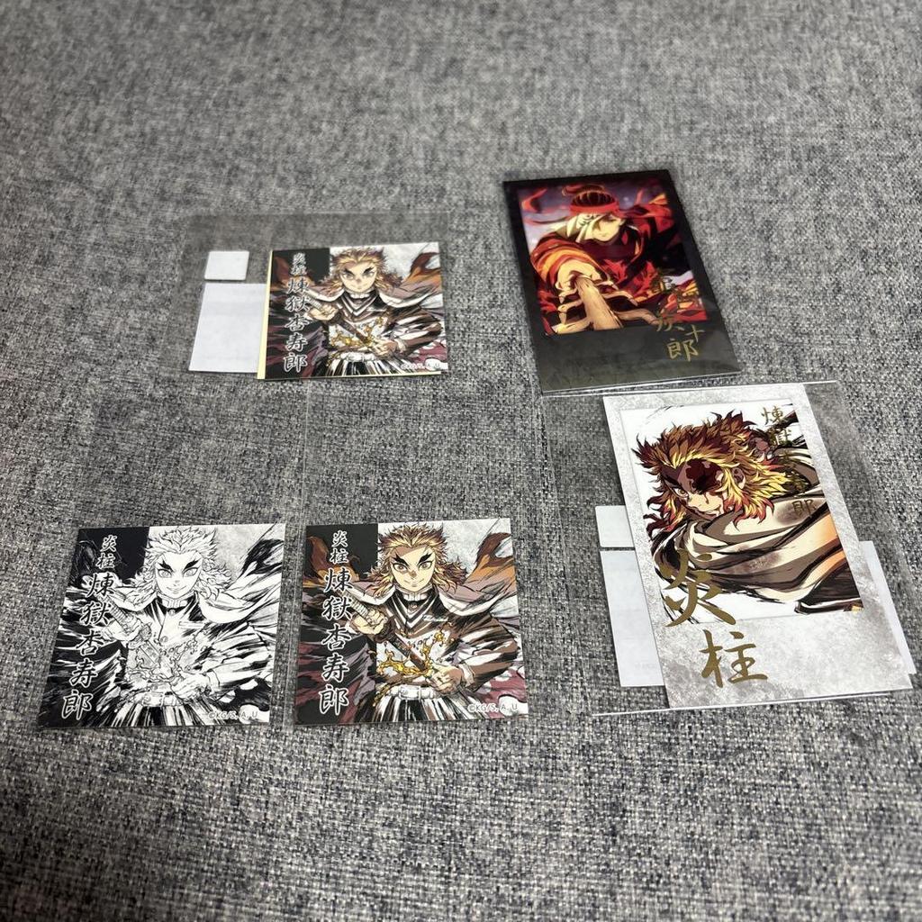 [USED] Demon Slayer: Kimetsu no Yaiba Interlude Artbook Original Illustration: Kyojuro Rengoku Acrylic Stand, Instax-Style Bromide