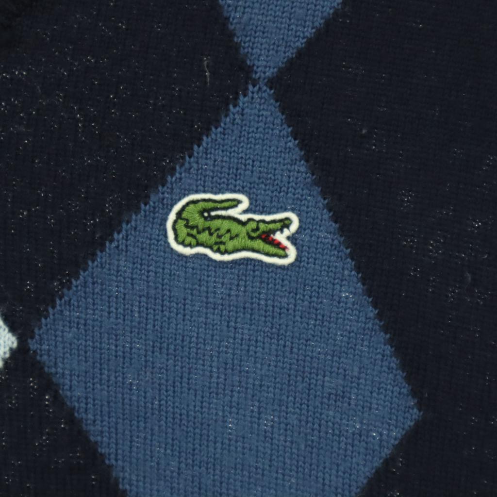 Lacoste Свитерок с V-образным вырезом, длинным рукавом, узором "ромбы" и логотипом на груди. 3 цвета: темно-синий. Мужской. Б/у.