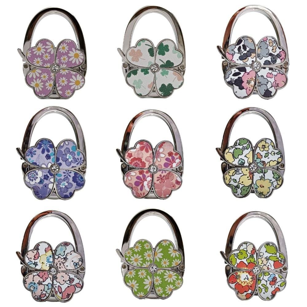 Прочный складной крючок для сумочки в виде четырехлистного клевера, креативный и красивый держатель для сумочки на стол.