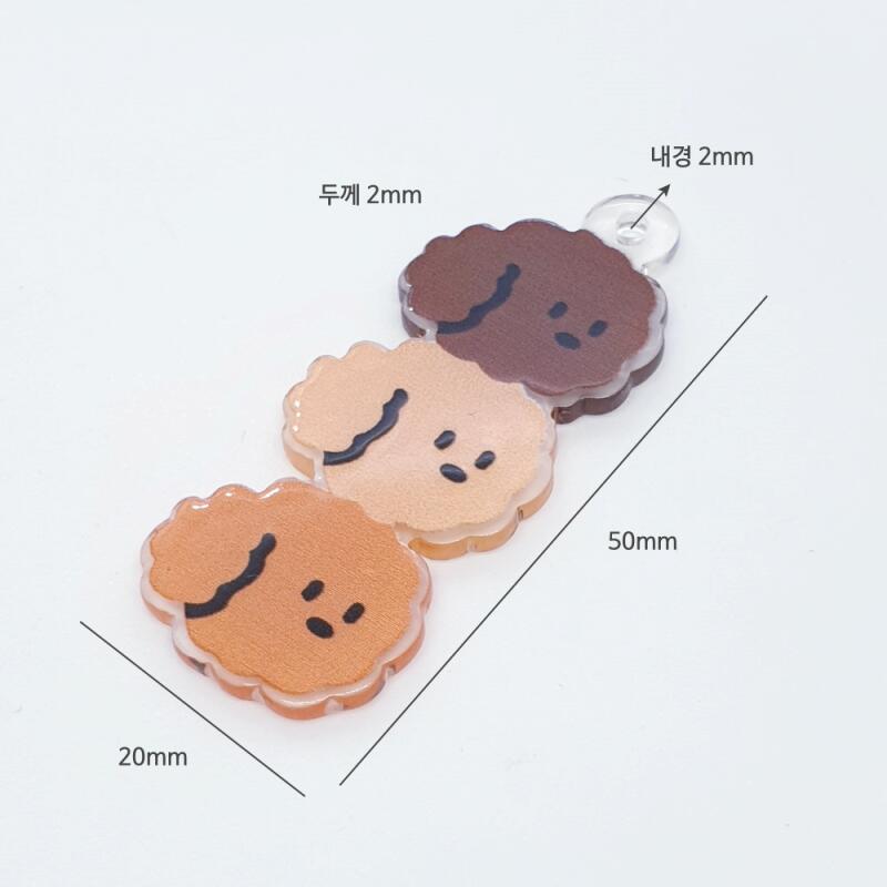 Materials for making a poodle puppy pendant and danggo skewer keychain