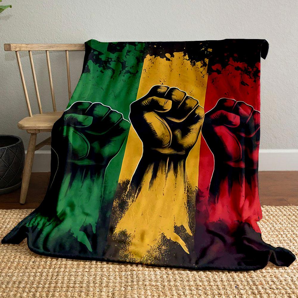 Three raised fists in green, yellow, and red with splattered backgrounds. for all seasons blanket lunch break throw gift