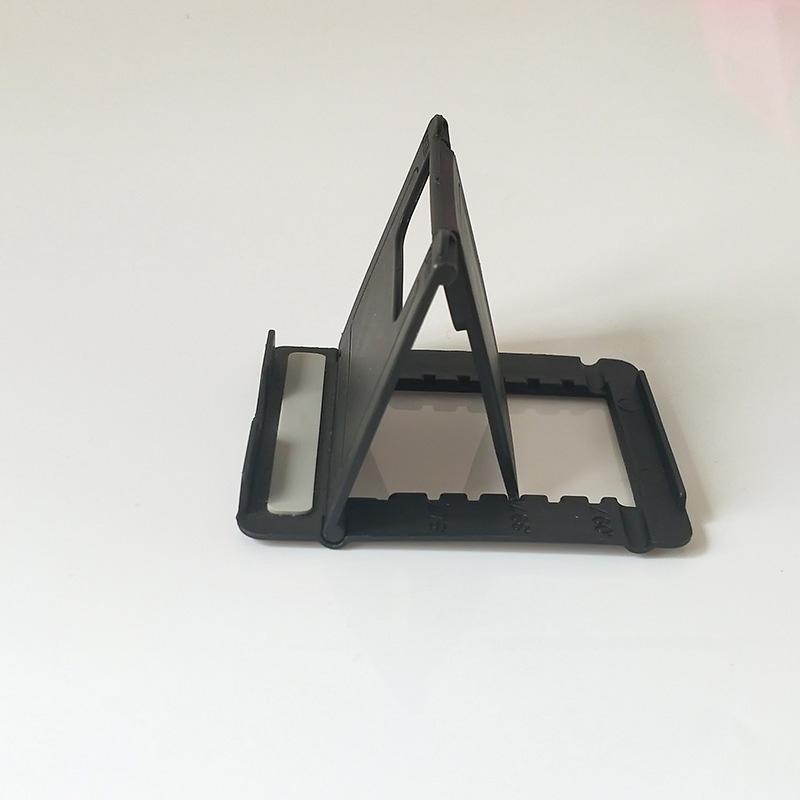 Folding Mobile Phone Holder Mini Adjustable Creative Portable Universal Folding Plastic Phone Holder Tablet Computer Stand For