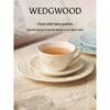 Wedgwood Праздничная чайная чашка и блюдце цвета слоновой кости.