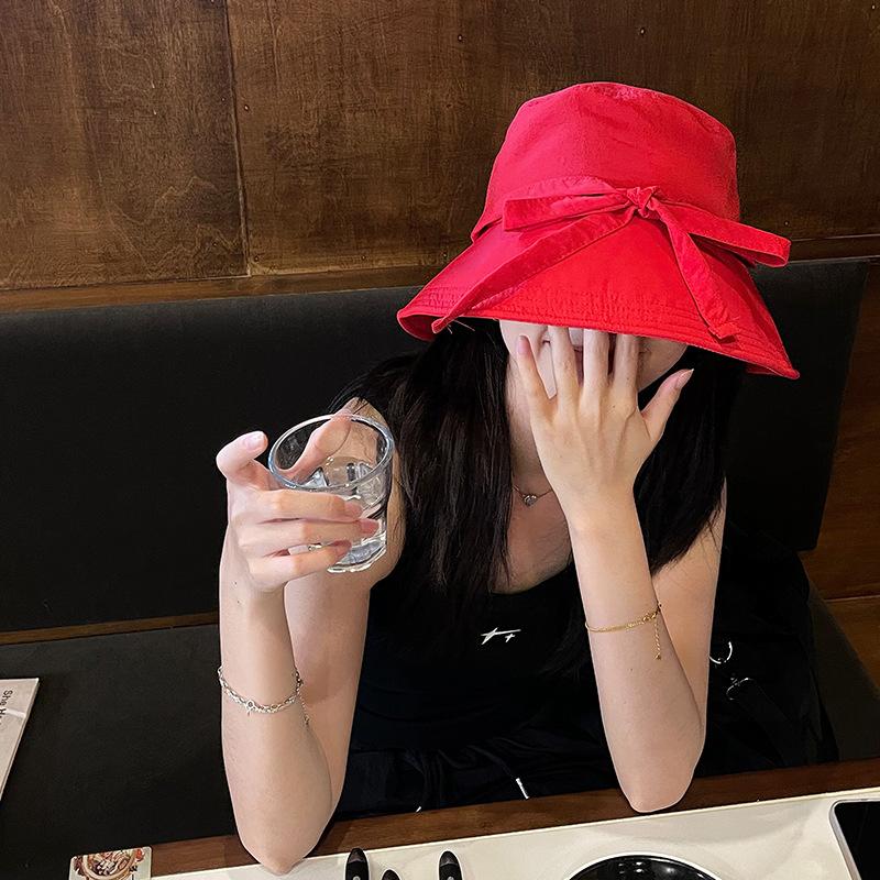 Big brim bow sunshade bucket hat women's summer temperament show face small straps beach sunscreen sun hat