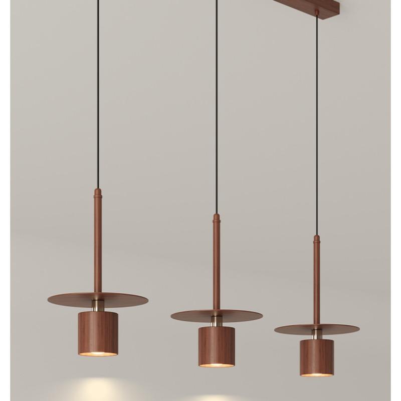 Простая вертикальная маленькая люстра для изголовья кровати