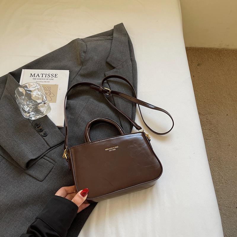 Премиальная текстура портативная сумка-ведро женская 2025 новая модная осенне-зимняя мода универсальная ретро деловая сумка на плечо через плечо