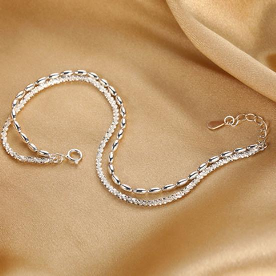 Женский браслет двухслойный регулируемой длины с удлиненной цепочкой из полой меди