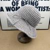 Big eaves breathable knitted bucket hat women's summer sunshade sunscreen hat thin belt bow versatile face small straw hat tide