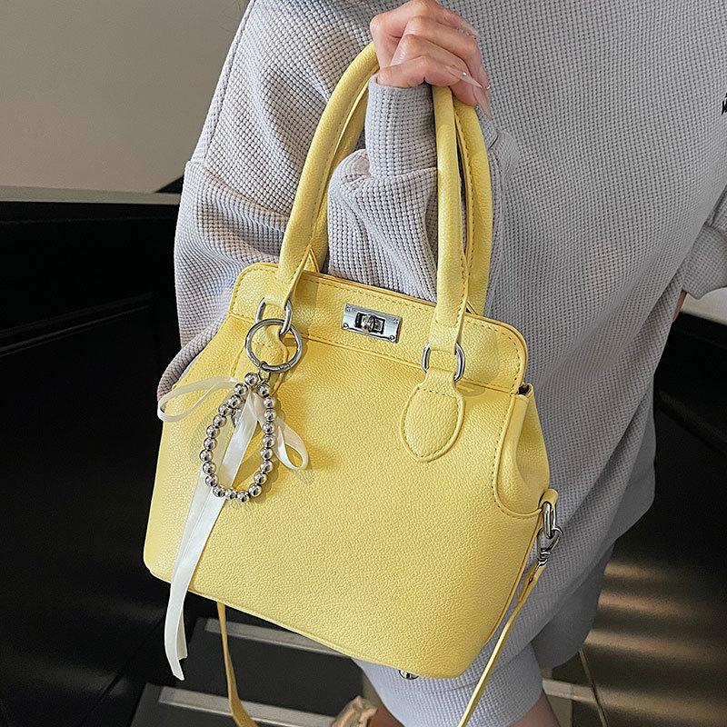 Popular Korean Niche Foreign Style Simple Style Portable Kelly Bag Women's Versatile Temperament Commuter Shoulder Messenger Bag