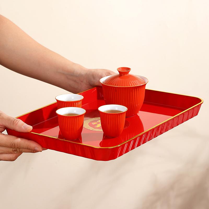 Red Rectangular Tray, Teacups, Water Cups, Plastic Plates In The Living Room, Chinese Wedding Candy Fruit Plate