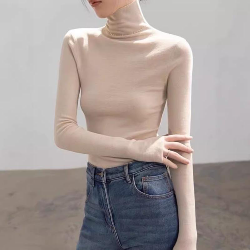 A spring, autumn and winter heap-neck knitted sweater, a new slim-fitting and thin temperament turtleneck bottoming shirt