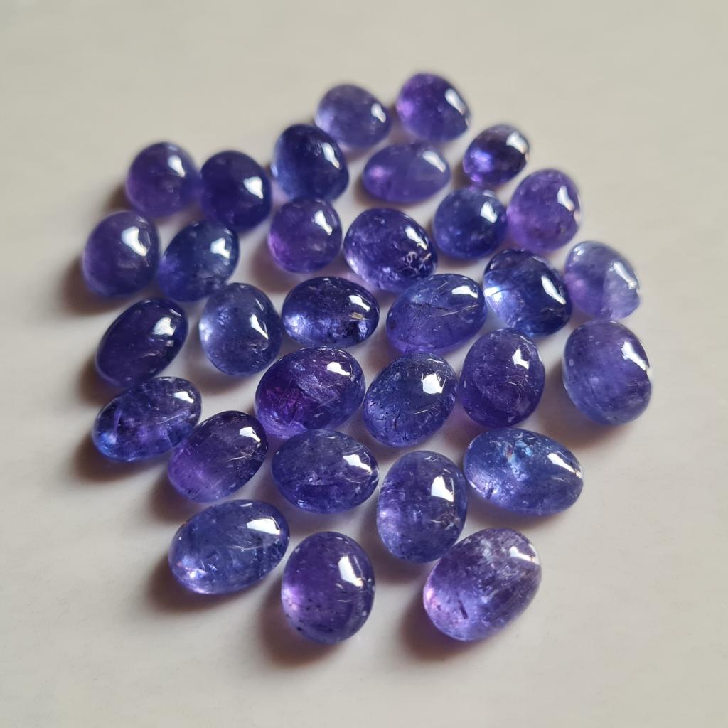 Натуральный танзанит кабошон овальной формы калиброванный размер хорошее качество танзанит россыпью камни для изготовления ювелирных изделий.