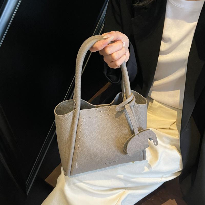 Сумка большой вместимости женская весна-лето универсальная 2025 новая повседневная ретро сумка-мессенджер простая и популярная портативная сумка-ведро