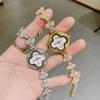 New Fashionable Four-leaf Clover Disc Women's Quartz Watch Light Luxury Elegant Rhinestone Simple Bracelet Watch