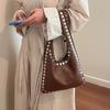Niche design rivet tote bag women's new fashion high sense commuting fashion versatile shoulder armpit bag