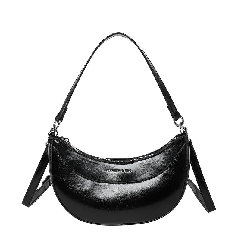 New product niche simple personality hand carry crescent moon bag versatile temperament commuter oil wax leather messenger bag female