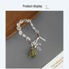 Nomadic Glacier Ethnic Style White Crystal Tassel Bracelet - Retro Design with Braided Rope