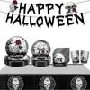 Halloween Party Supplies Include Paper Plates, Cups, Napkins, Tablecloth, Banner