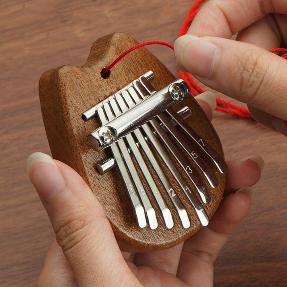 Easy-to-Learn 8 Keys Kalimba Marimba Thumb Piano Necklace Finger Piano Beginners