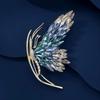 The Gradient Colored Butterfly Brooch Exudes An Elegant Charm. The Crystal Brooch Has A Niche Design Sense