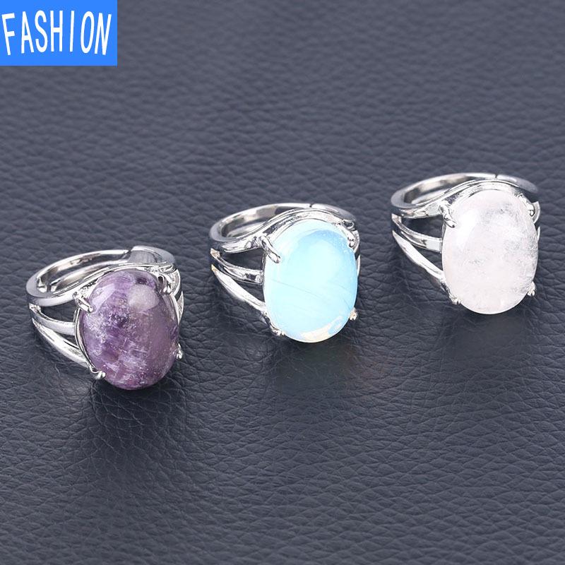 Oval Natural Crystal Four-claw Inlaid Hollow Ring