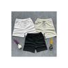 Набор из трех мужских шорт стандартного кроя черного, белого, серого цвета