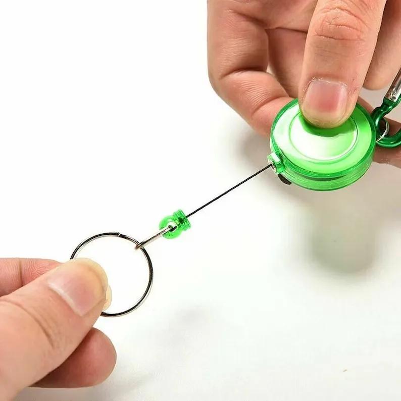 Выдвижной стальной шнур, катушка, брелки, пружинная пряжка, застежка, веревка, брелок для ключей, держатель для удостоверения личности, спортивный несколько инструментов