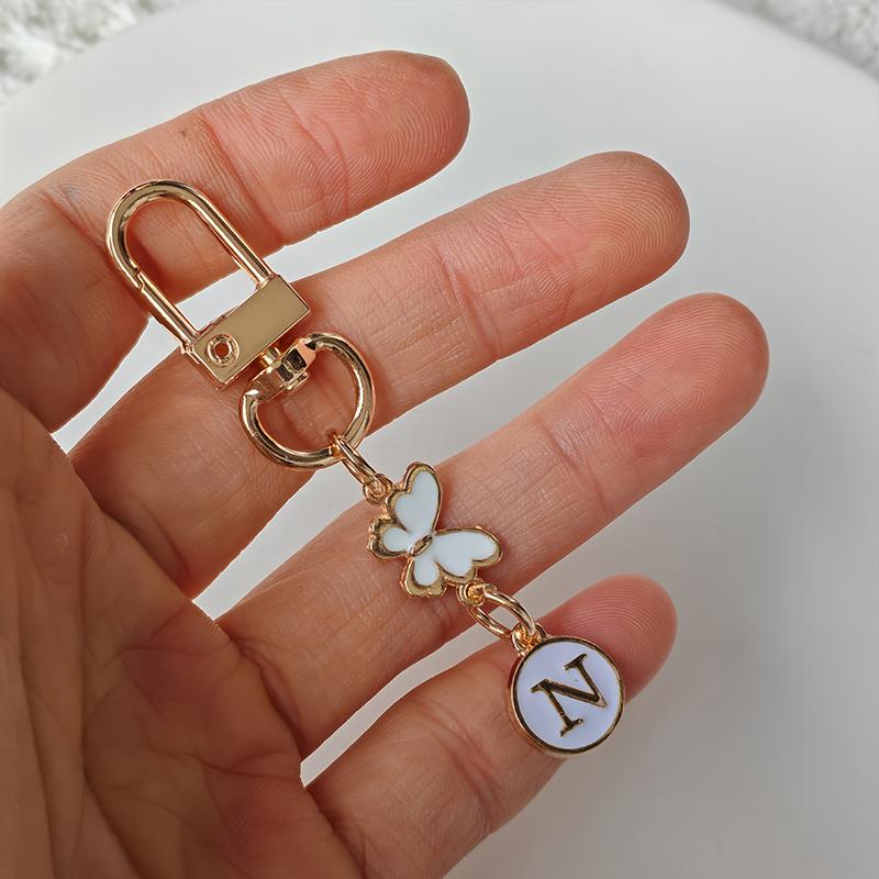 1Pc Key Logo Monogram Charm Key Fob Durability Bag Charm Lightweight Butterfly Monogram Keychain Car Key Companion Metal Keychain