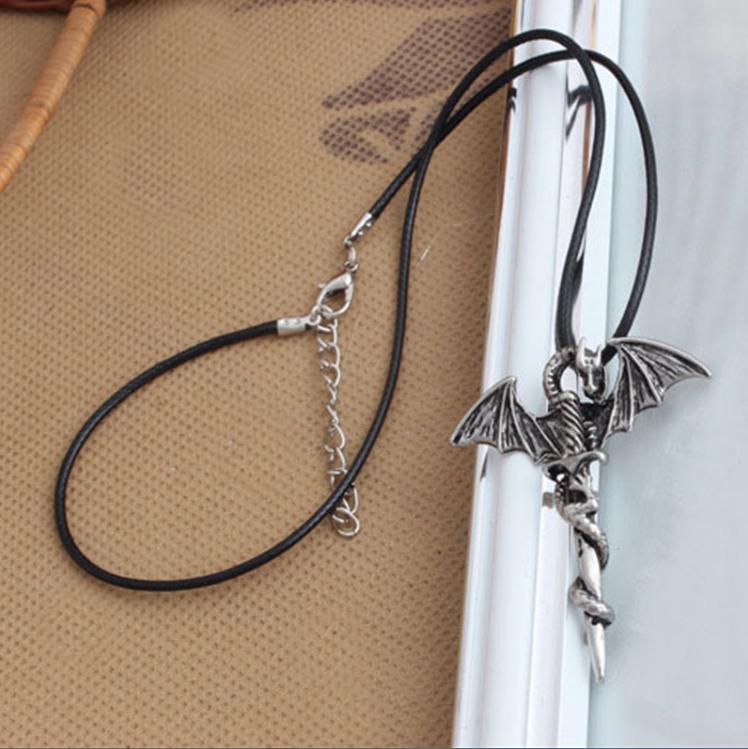 Кулон из нержавеющей стали в виде дракона захватившего меч