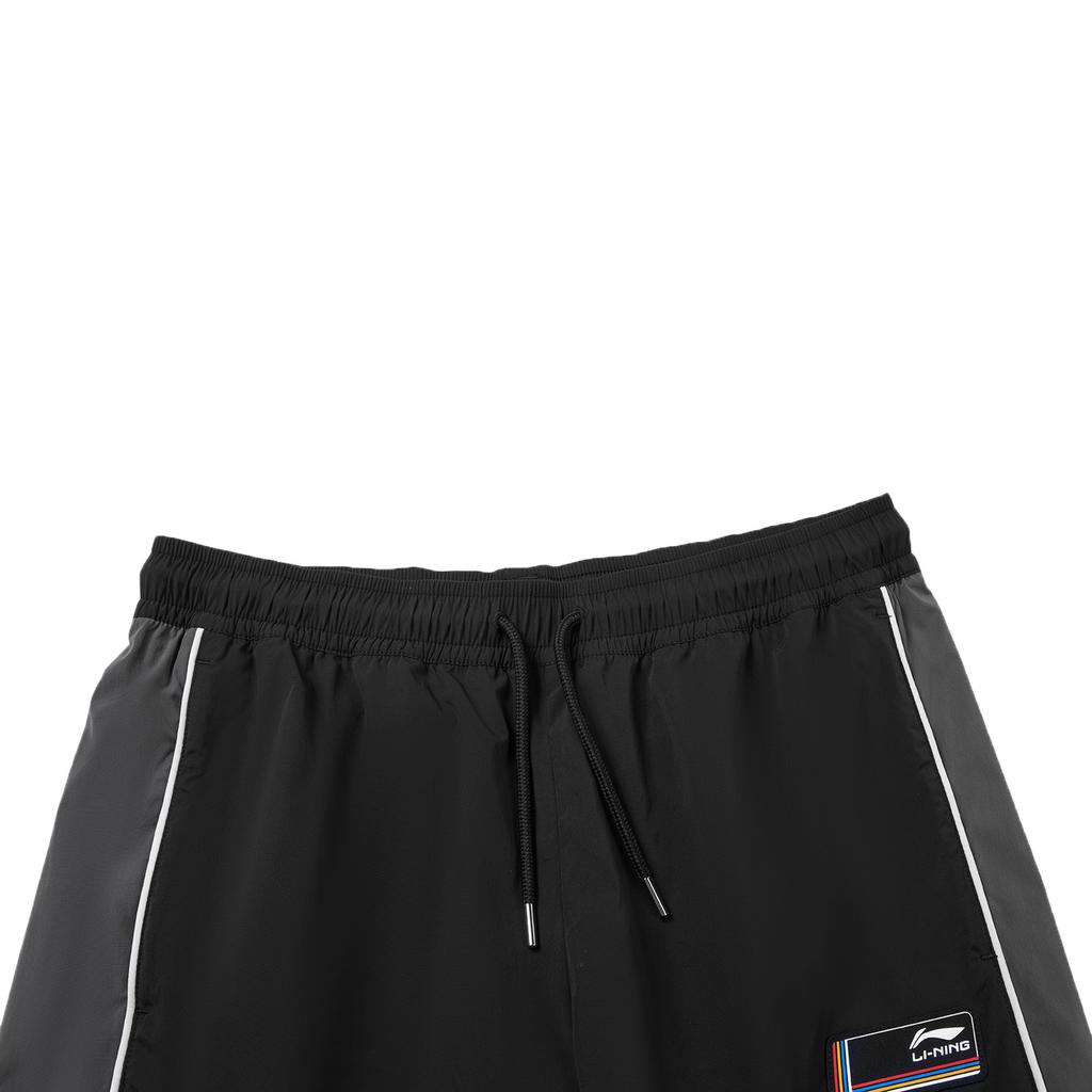 Li-Ning Спортивный стиль Серия Ветрозащитные Водоотталкивающие Логотип Цветной блок Повседневные брюки Мужские низы AYKW451-1
