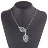 Korean fashion trend wild forest-based metal leaf pendant necklace clavicle short section of double-leaf Zircon  free shipping