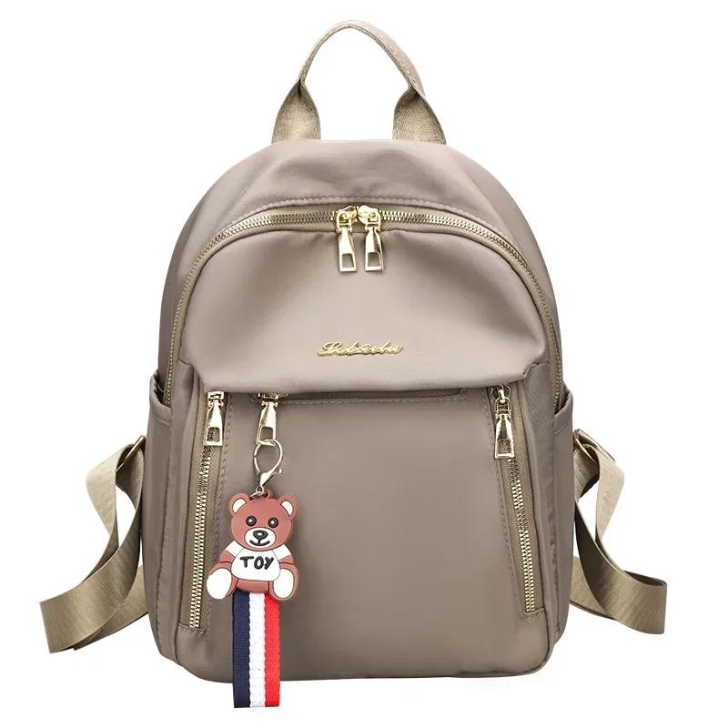 Новый однотонный водонепроницаемый нейлоновый модный большой вместимости повседневный и универсальный женский рюкзак для поездок на работу