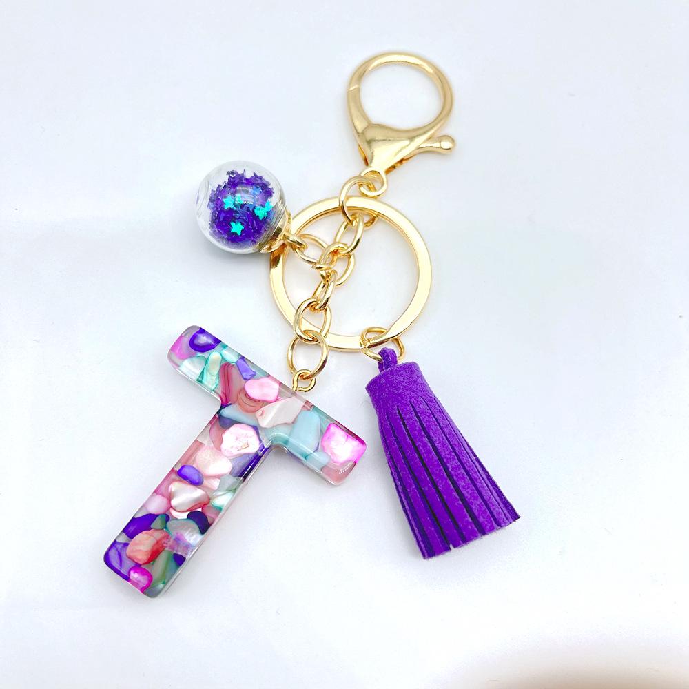 Европейский и американский хит продаж брелок с английскими инициалами и фиолетовой кисточкой