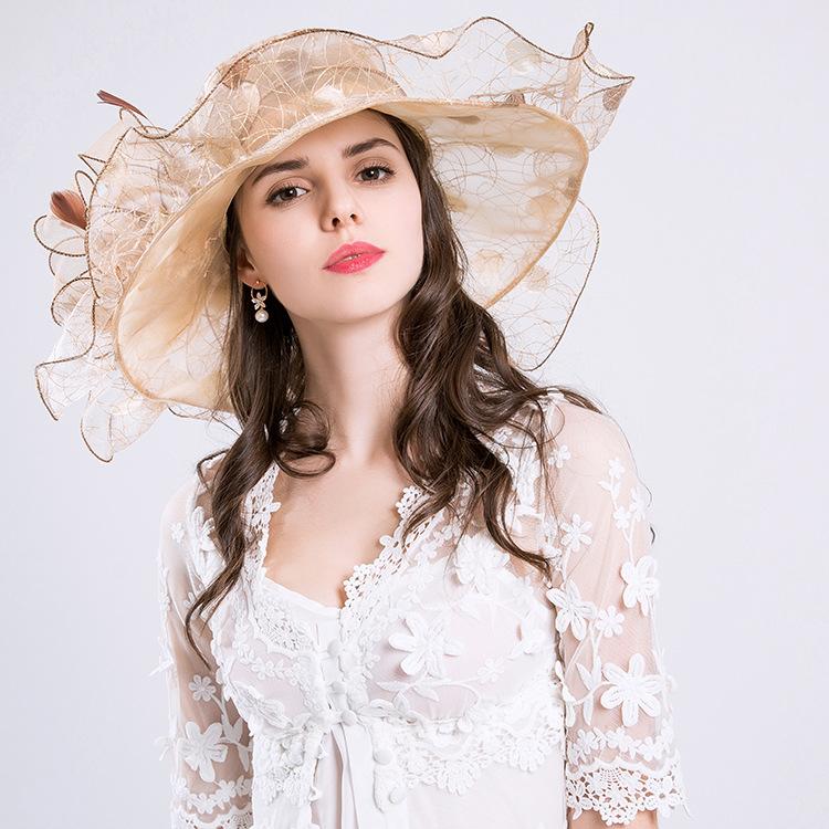 A new summer anti-ultraviolet European and American women's fashion hat, big flower fashion mesh hat, big edge hat.