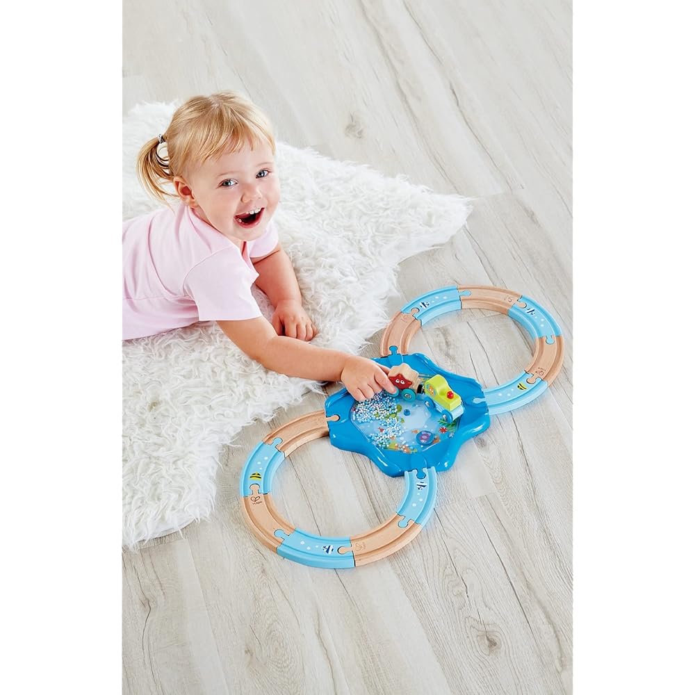 Hape Ocean Rolling 8 Figure Rail Set E3827 with colorful design, durable construction, and engaging play features
