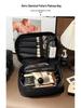 Korean Style Argyle Makeup Bag: Large Capacity, Fashionable Handheld Cosmetic Organizer for Convenient Travel.