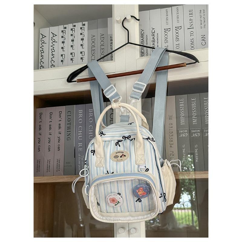 Новый школьный рюкзак - это высококачественный, свежий и милый клетчатый узор, ленивый и прозрачный, и мини-рюкзак для девочки.