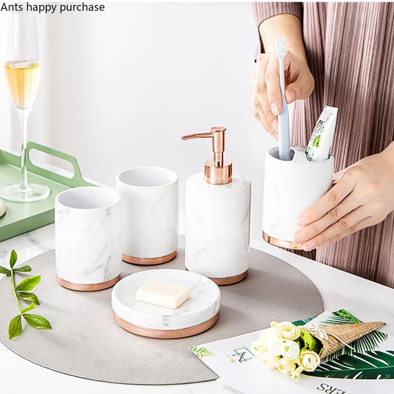 Керамика Набор для ванной комнаты Туалетные принадлежности Стаканчик для рта Подставка для зубных щеток Мыльница Флакон для лосьона Флакон для ароматерапии Набор для ванной комнаты из пяти предметов