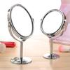 High-Definition Double-Sided Metal Desktop Makeup Mirror with Magnification and Rotating Feature