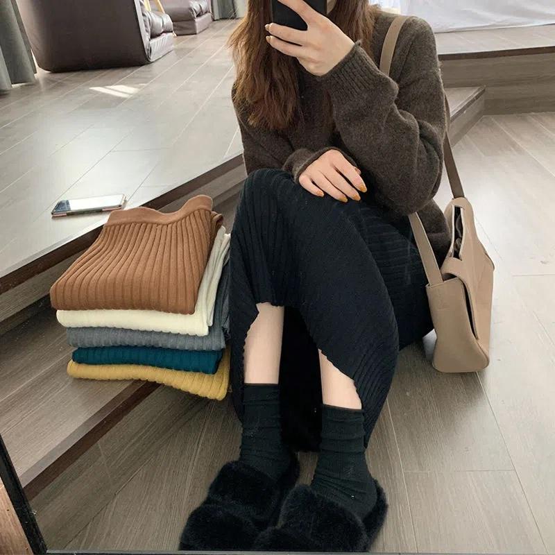 Женские юбки Осень и зима без разрезов Трикотажные юбки средней длины с высокой талией Тонкая юбка трапециевидной формы