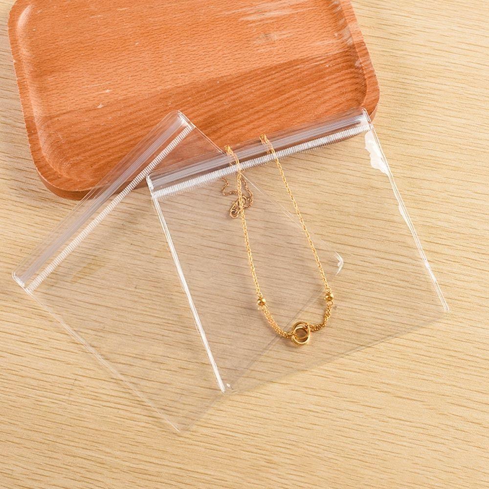 Браслет Кольцо Широкие мешочки для хранения ПВХ Пластиковые самозапечатывающиеся пакеты Zip Lock Сумки для ювелирных изделий