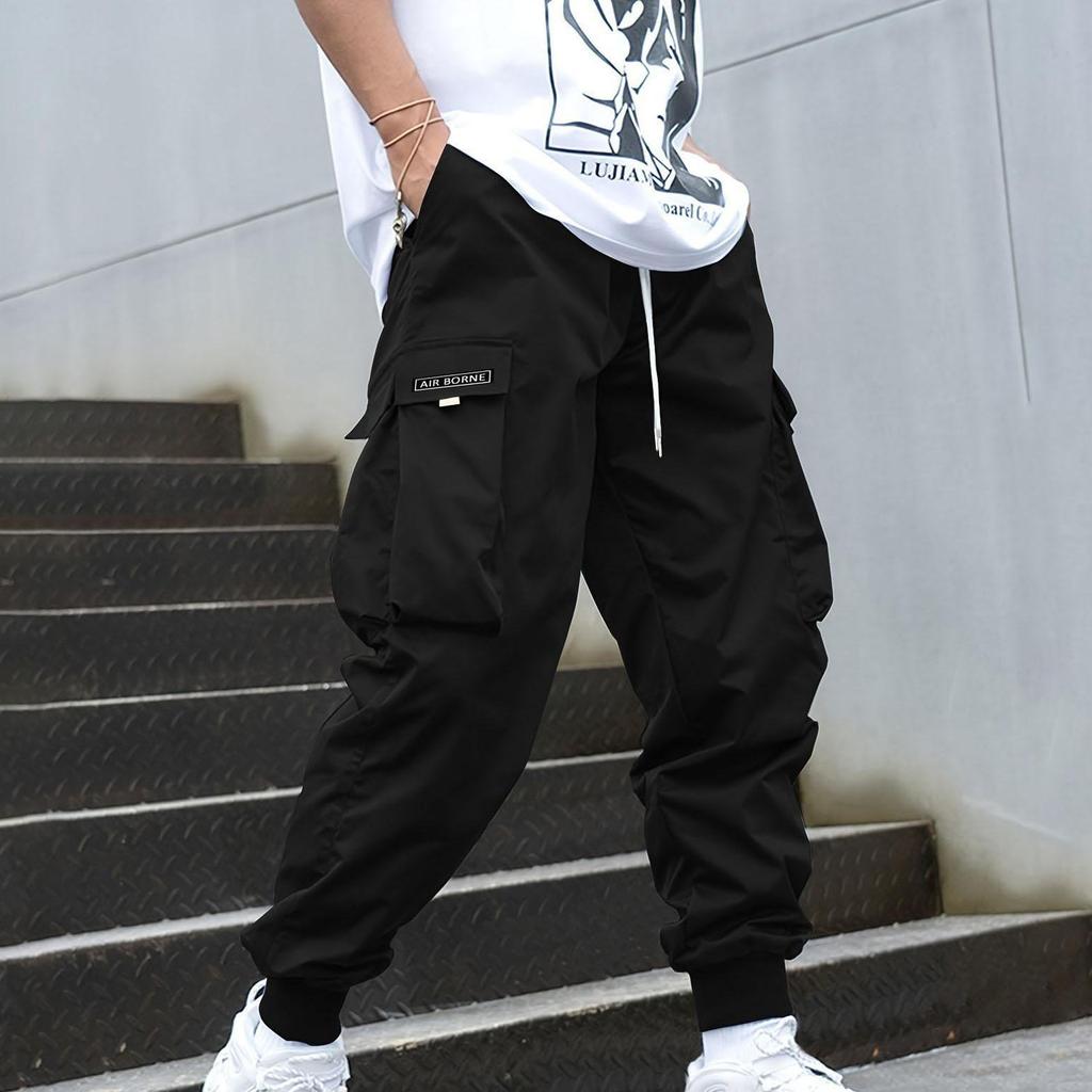 Мужские брюки-карго с карманами и боковыми шнурками на талии