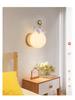 Nordic Moon Astronaut Wall Light for Kids' Rooms - Creative Cartoon Bedside Lamp for Boys and Girls.