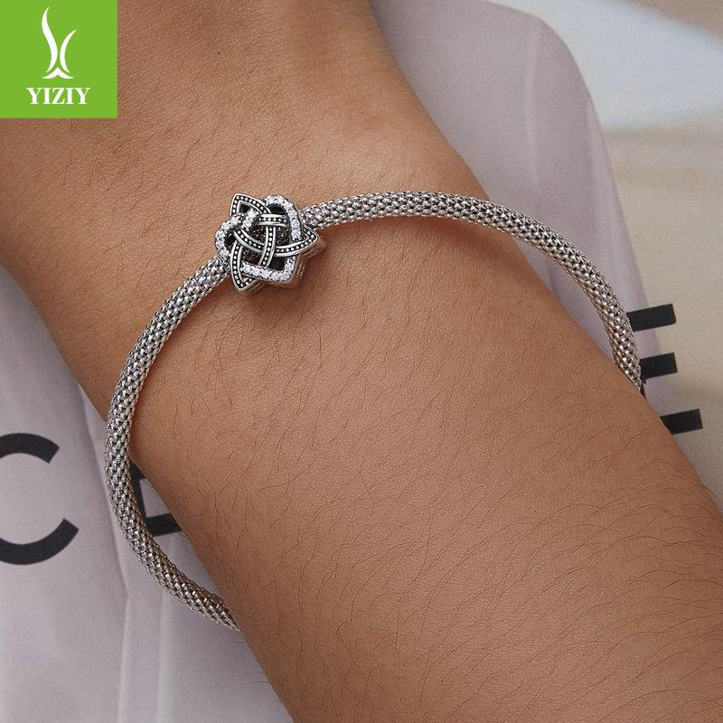 Браслет-шарм «Кельтский узел любви», украшенный полыми серебряными бусинами S925