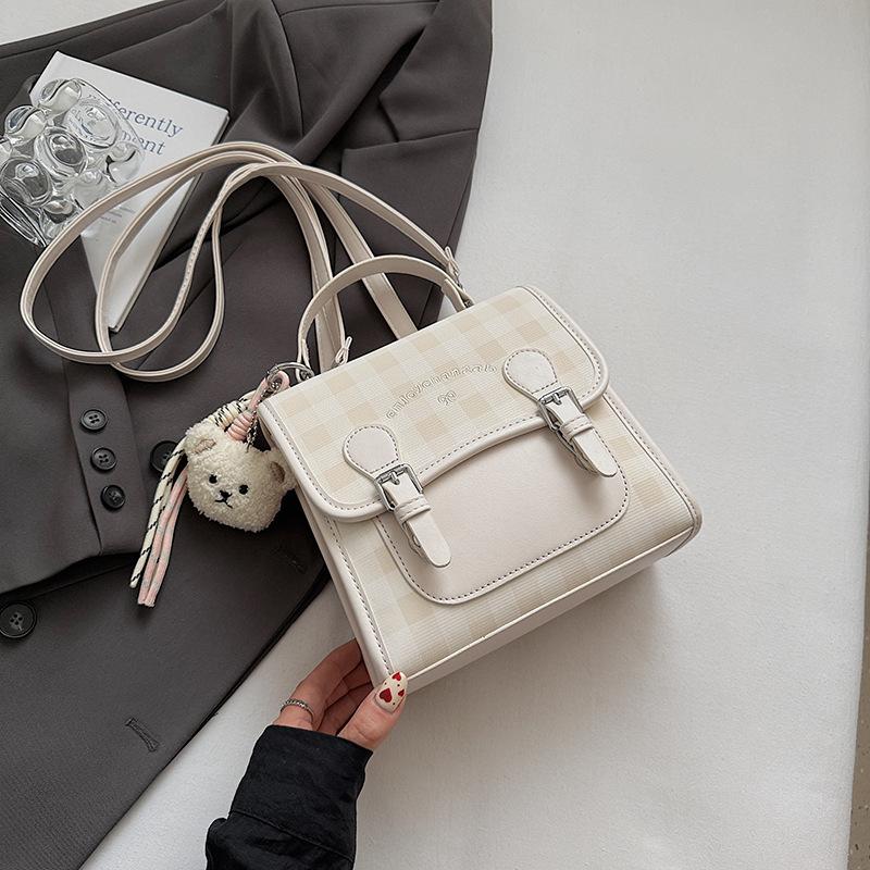 Casual plaid women's backpack 2025 summer new small backpack high value contrasting color portable small schoolbag