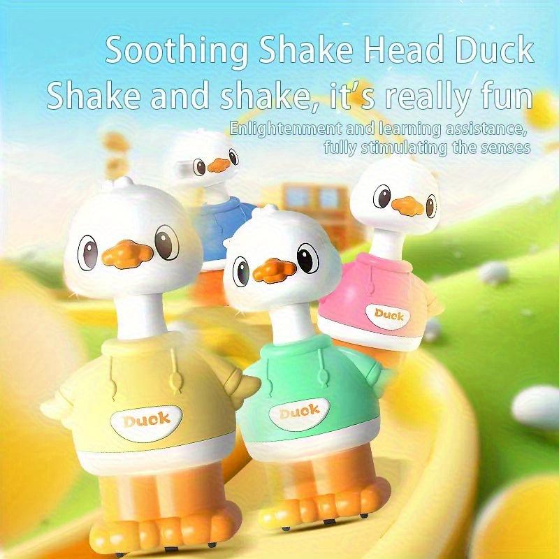 A Cartoon-shaped Sliding Toy, a Little Yellow Duck, That Bounces Back When the Youngsters Pushes It.