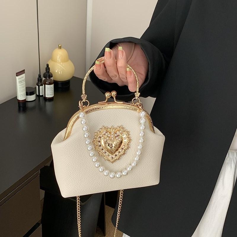 Сумка-клатч Xiaoxiangfeng с жемчугом, женская, 2025 новая, корейская версия, модная нишевая сумка через плечо, кроссбоди, сумка-ракушка с клипсой