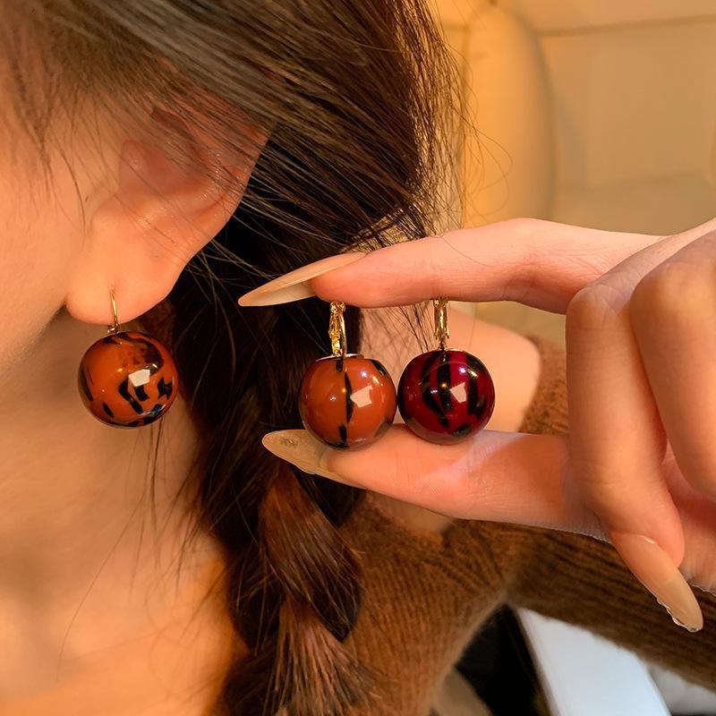 2024 Fall/Winter Leopard Print Light Luxury Resin Ball Earrings for Women - High-End, Niche Design, Internet Celebrity Favorites